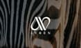 design a minimal wordmark or lettering logo with editorial detail