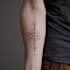 create a geometric tattoo design