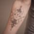 create a minimalist fine line tattoo design