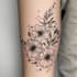 do floral and minimalist tattoo design