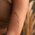 design a delicate custom fine line tattoo