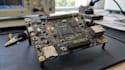 convert your schematic into pcb layout and gerber files