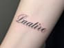 design a delicate fine line tattoo lettering