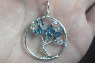 send you this sterling plated winter tree pendant