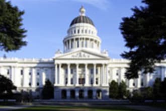 place a sign that has a phrase of your choice in front of the California Capitol building and take a photograph