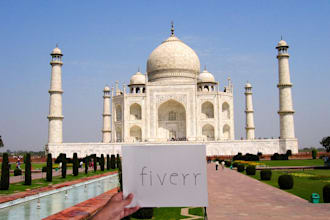 hold your sign at the taj mahal which is 1 of 7 WONDERS of world