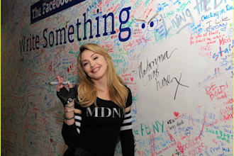 make madonna wear your logo and write anything on a board