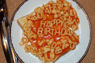 write the short message of your choice in alphabetti spaghetti on toast or plate