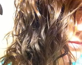 teach you how to twist set your naturally curly hair to get defined curls via pictures and step by step instructions