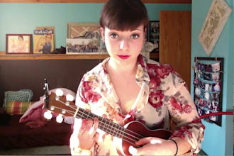 play a simple song of your choice on the ukulele