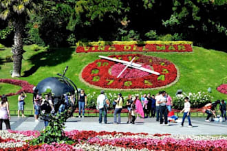 take 10 pictures holding your sign in front of the Chilean flower clock