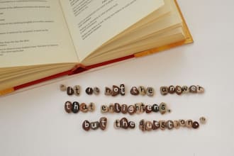 create a miniature message or quote from tiny stones