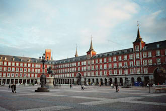 send 2 postcards with any message, from Madrid