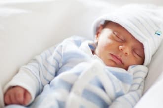 sing a lullaby to put baby to sleep