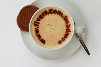 write a short message in the froth of a cup of cappuccino coffee, NOT photoshop
