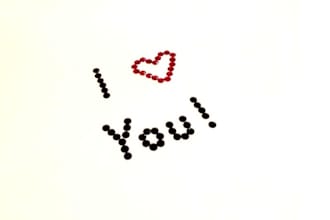 write out a message using rhinestones