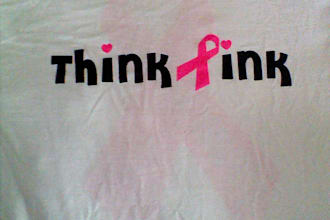 run 2 miles in a breast cancer awareness shirt