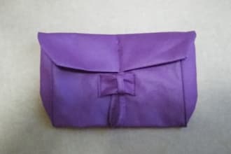 teach you how to sew a clutch using recycled materials