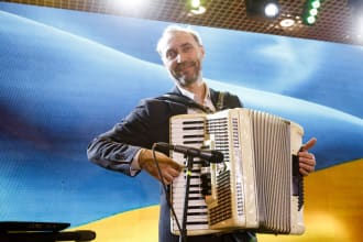 pick out a tune by ear and play the accordion or piano