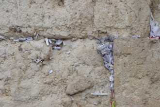 put your prayer note in the stones of the western wall