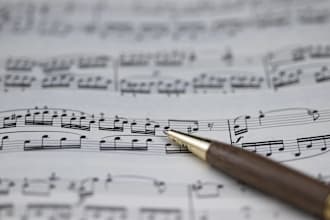 transcribe the monophonic instruments to sheet music from audio by ear