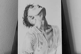 couple pencil and charcoal portraits