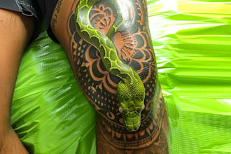 do custom tattoo design , anime , traditional or realistic sleeve tattoo artist