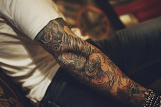 design a custom tattoo or sleeve