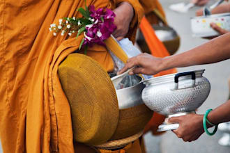 offer food to buddhist monks in thai traditional style on your behalf