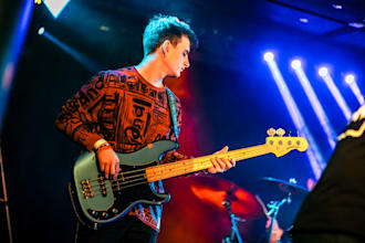 give you guitar and bass lessons