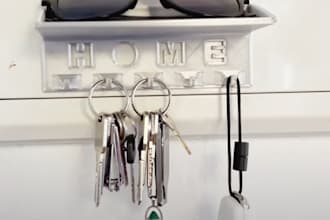 design a 3d printable custom key holder with your text