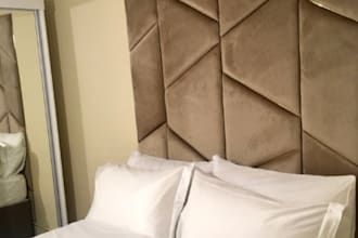 help to make a luxury upholstered headboard on a budget