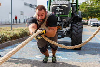 create a personalized strongman training plan