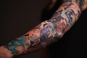 make custom anime tattoo sleeve renowned tattoo artist