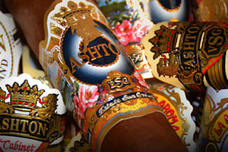 create an stunning cigar logo, cigar box, cigar band and event label design