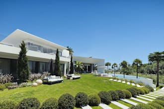 remodel vacation house, villa exterior shot, outdoor seating, greenery landscape