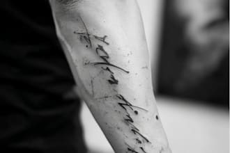 design unique handdrawn persian arabic calligraphy tattoo