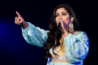 create emotional bollywood songs as a female singer and lyricist