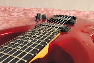 compose boss fight music with electric guitar