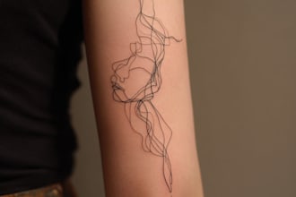 create a minimalist fine line tattoo design