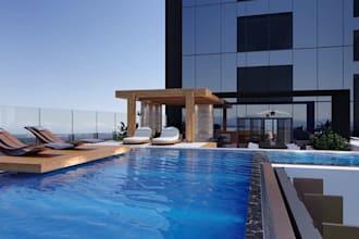 luxury hotel rooftop, high end hospitality area, furniture layout,outdoor render