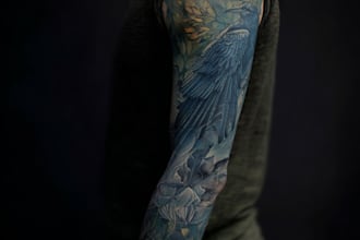create sleeve tattoo design in geometric style