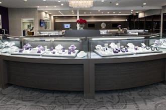 design modern jewelry store interior, elegant showroom decor, luxury gold shop