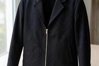 a jacket with an embroidered outline of  butterflies