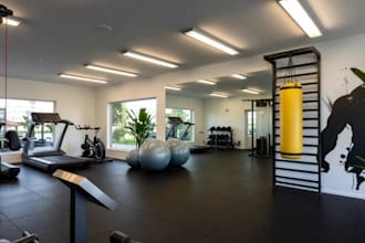 revamp modern spacious gym, fitness room interior design, resort space rendering