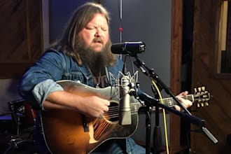 record authentic outlaw country vocals and write original country songs