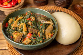cooking efo riro ati pounded yam to soft food