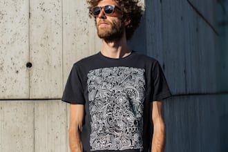 design a hand carved style linocut t shirt and vintage stamp illustration