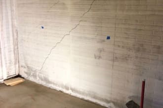 assess foundation cracks, settlement and structural distress