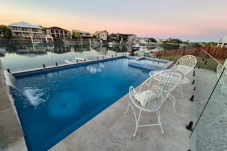 design a 3d swimming pool, backyard and outdoor living space